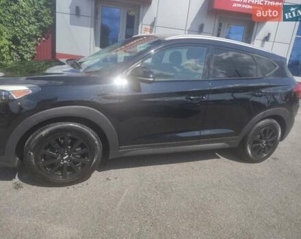 Чорний Хендай Туксон, об'ємом двигуна 2 л та пробігом 150 тис. км за 15500 $, фото 3 на Automoto.ua