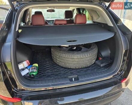 Черный Хендай Туксон, объемом двигателя 1.98 л и пробегом 112 тыс. км за 18300 $, фото 12 на Automoto.ua