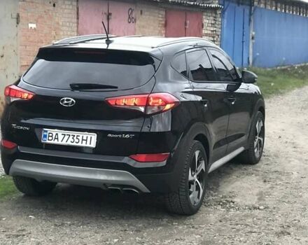 Черный Хендай Туксон, объемом двигателя 1.59 л и пробегом 188 тыс. км за 15500 $, фото 2 на Automoto.ua