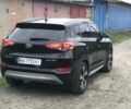 Черный Хендай Туксон, объемом двигателя 1.59 л и пробегом 188 тыс. км за 15500 $, фото 2 на Automoto.ua