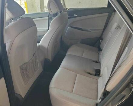 Чорний Хендай Туксон, об'ємом двигуна 2 л та пробігом 104 тис. км за 10100 $, фото 2 на Automoto.ua