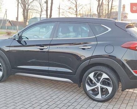 Чорний Хендай Туксон, об'ємом двигуна 2 л та пробігом 192 тис. км за 21000 $, фото 19 на Automoto.ua