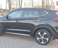 Чорний Хендай Туксон, об'ємом двигуна 2 л та пробігом 192 тис. км за 21000 $, фото 19 на Automoto.ua