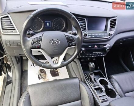 Черный Хендай Туксон, объемом двигателя 2 л и пробегом 178 тыс. км за 19200 $, фото 1 на Automoto.ua