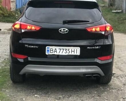 Черный Хендай Туксон, объемом двигателя 1.59 л и пробегом 188 тыс. км за 15500 $, фото 1 на Automoto.ua