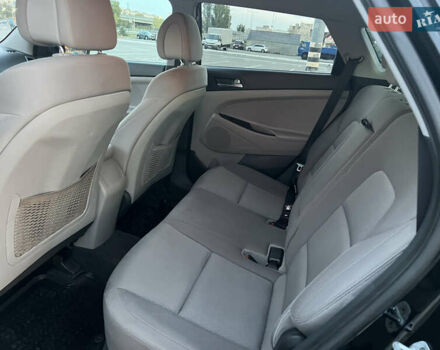 Черный Хендай Туксон, объемом двигателя 2 л и пробегом 159 тыс. км за 16500 $, фото 23 на Automoto.ua