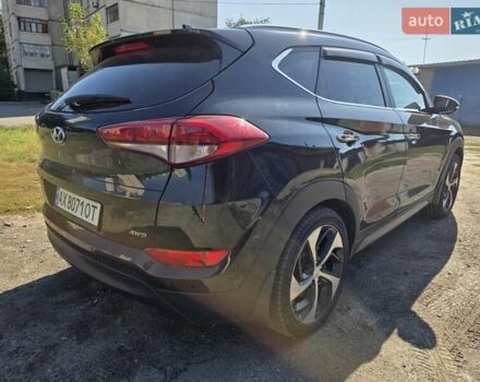 Черный Хендай Туксон, объемом двигателя 1.98 л и пробегом 112 тыс. км за 18300 $, фото 7 на Automoto.ua