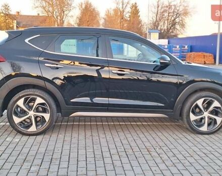 Чорний Хендай Туксон, об'ємом двигуна 2 л та пробігом 192 тис. км за 21000 $, фото 8 на Automoto.ua