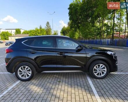 Черный Хендай Туксон, объемом двигателя 2 л и пробегом 215 тыс. км за 18900 $, фото 5 на Automoto.ua