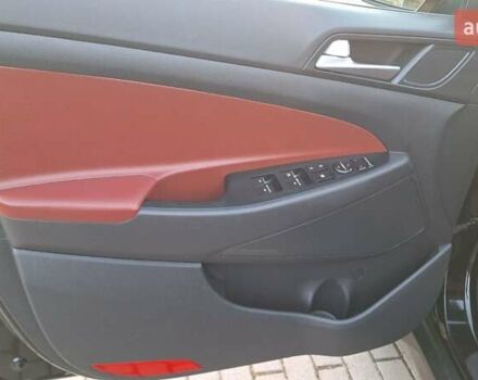 Черный Хендай Туксон, объемом двигателя 2 л и пробегом 192 тыс. км за 19999 $, фото 16 на Automoto.ua