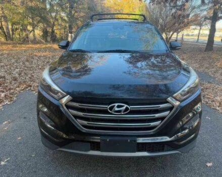 Черный Хендай Туксон, объемом двигателя 1.6 л и пробегом 99 тыс. км за 9600 $, фото 1 на Automoto.ua