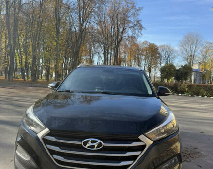 Черный Хендай Туксон, объемом двигателя 2 л и пробегом 100 тыс. км за 16300 $, фото 6 на Automoto.ua