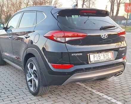 Чорний Хендай Туксон, об'ємом двигуна 2 л та пробігом 192 тис. км за 21000 $, фото 13 на Automoto.ua