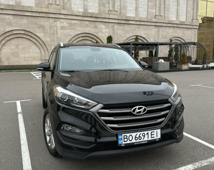 Черный Хендай Туксон, объемом двигателя 2 л и пробегом 120 тыс. км за 17800 $, фото 9 на Automoto.ua