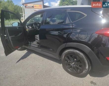 Чорний Хендай Туксон, об'ємом двигуна 2 л та пробігом 150 тис. км за 15500 $, фото 2 на Automoto.ua