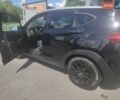 Чорний Хендай Туксон, об'ємом двигуна 2 л та пробігом 150 тис. км за 15500 $, фото 2 на Automoto.ua