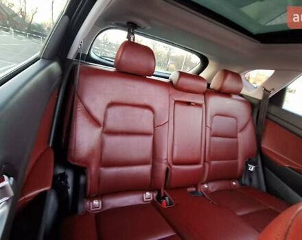 Чорний Хендай Туксон, об'ємом двигуна 2 л та пробігом 192 тис. км за 21000 $, фото 51 на Automoto.ua