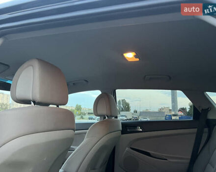 Черный Хендай Туксон, объемом двигателя 2 л и пробегом 159 тыс. км за 16500 $, фото 24 на Automoto.ua