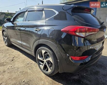Черный Хендай Туксон, объемом двигателя 1.98 л и пробегом 112 тыс. км за 18300 $, фото 6 на Automoto.ua