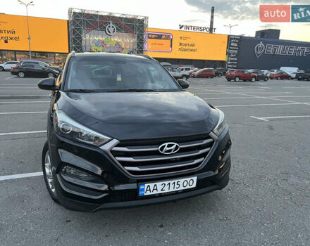 Черный Хендай Туксон, объемом двигателя 2 л и пробегом 159 тыс. км за 16500 $, фото 1 на Automoto.ua