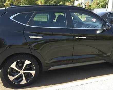 Черный Хендай Туксон, объемом двигателя 2 л и пробегом 44 тыс. км за 20500 $, фото 4 на Automoto.ua