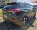 Чорний Хендай Туксон, об'ємом двигуна 1.98 л та пробігом 110 тис. км за 18700 $, фото 6 на Automoto.ua