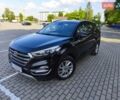 Черный Хендай Туксон, объемом двигателя 2 л и пробегом 215 тыс. км за 18900 $, фото 1 на Automoto.ua