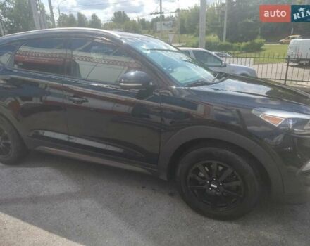 Чорний Хендай Туксон, об'ємом двигуна 2 л та пробігом 150 тис. км за 15500 $, фото 5 на Automoto.ua