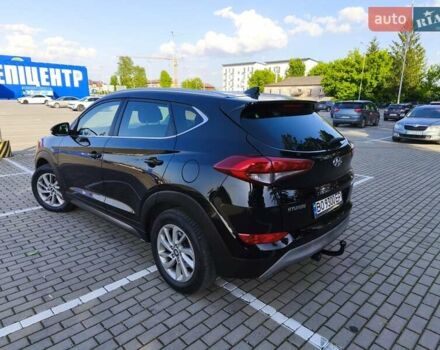 Черный Хендай Туксон, объемом двигателя 2 л и пробегом 215 тыс. км за 18900 $, фото 12 на Automoto.ua