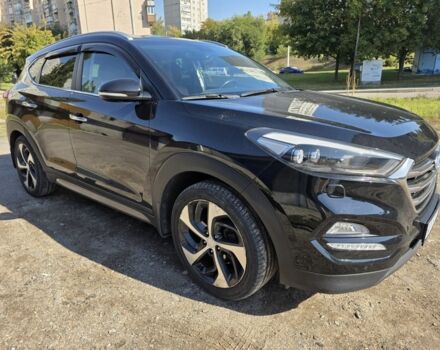 Чорний Хендай Туксон, об'ємом двигуна 2 л та пробігом 110 тис. км за 18700 $, фото 1 на Automoto.ua