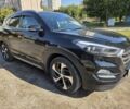 Чорний Хендай Туксон, об'ємом двигуна 2 л та пробігом 110 тис. км за 18700 $, фото 1 на Automoto.ua