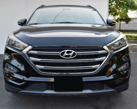 Черный Хендай Туксон, объемом двигателя 1.6 л и пробегом 73 тыс. км за 16200 $, фото 1 на Automoto.ua