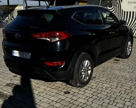 Черный Хендай Туксон, объемом двигателя 2 л и пробегом 222 тыс. км за 14000 $, фото 2 на Automoto.ua