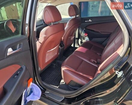 Черный Хендай Туксон, объемом двигателя 1.98 л и пробегом 112 тыс. км за 18300 $, фото 11 на Automoto.ua