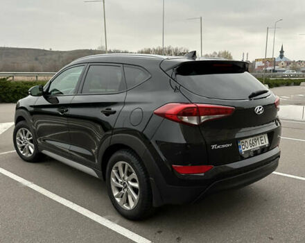 Черный Хендай Туксон, объемом двигателя 2 л и пробегом 120 тыс. км за 17800 $, фото 6 на Automoto.ua