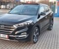 Черный Хендай Туксон, объемом двигателя 2 л и пробегом 192 тыс. км за 19999 $, фото 4 на Automoto.ua
