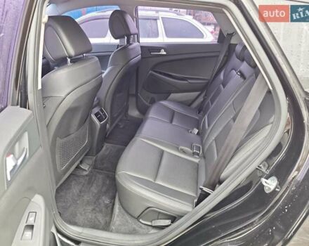 Черный Хендай Туксон, объемом двигателя 2 л и пробегом 178 тыс. км за 19200 $, фото 4 на Automoto.ua