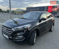 Черный Хендай Туксон, объемом двигателя 2 л и пробегом 159 тыс. км за 16500 $, фото 4 на Automoto.ua