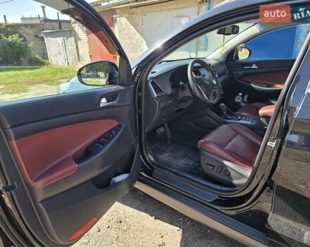 Черный Хендай Туксон, объемом двигателя 1.98 л и пробегом 112 тыс. км за 18300 $, фото 8 на Automoto.ua