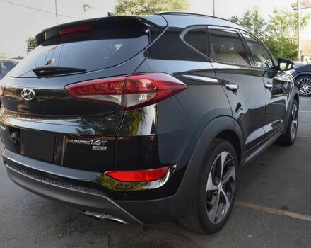 Черный Хендай Туксон, объемом двигателя 1.6 л и пробегом 73 тыс. км за 16200 $, фото 4 на Automoto.ua