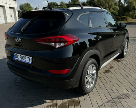 Черный Хендай Туксон, объемом двигателя 2 л и пробегом 110 тыс. км за 18000 $, фото 8 на Automoto.ua