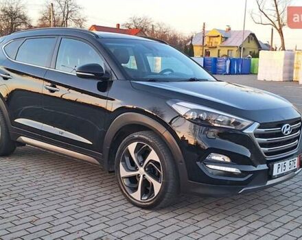 Чорний Хендай Туксон, об'ємом двигуна 2 л та пробігом 192 тис. км за 21000 $, фото 6 на Automoto.ua