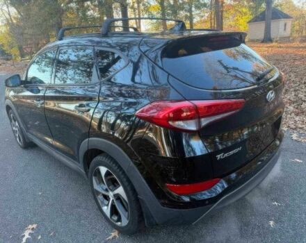 Черный Хендай Туксон, объемом двигателя 1.6 л и пробегом 99 тыс. км за 9600 $, фото 4 на Automoto.ua