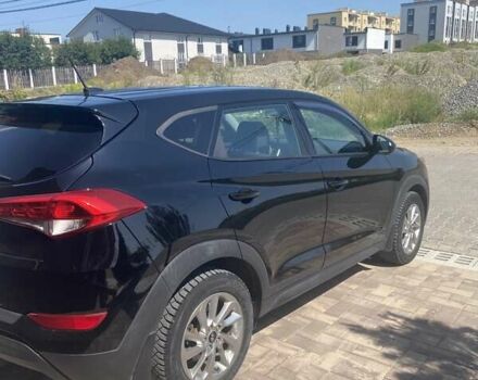 Черный Хендай Туксон, объемом двигателя 2 л и пробегом 126 тыс. км за 14500 $, фото 6 на Automoto.ua
