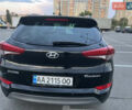 Черный Хендай Туксон, объемом двигателя 2 л и пробегом 159 тыс. км за 16500 $, фото 11 на Automoto.ua