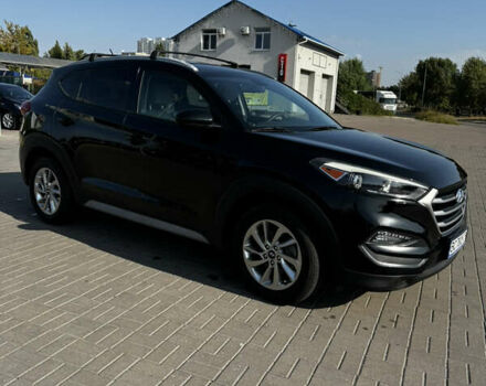 Черный Хендай Туксон, объемом двигателя 2 л и пробегом 110 тыс. км за 18000 $, фото 2 на Automoto.ua