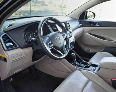 Черный Хендай Туксон, объемом двигателя 1.6 л и пробегом 73 тыс. км за 16200 $, фото 9 на Automoto.ua