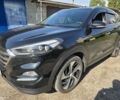 Черный Хендай Туксон, объемом двигателя 2 л и пробегом 110 тыс. км за 18700 $, фото 1 на Automoto.ua