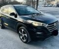 Черный Хендай Туксон, объемом двигателя 1.6 л и пробегом 71 тыс. км за 9000 $, фото 2 на Automoto.ua