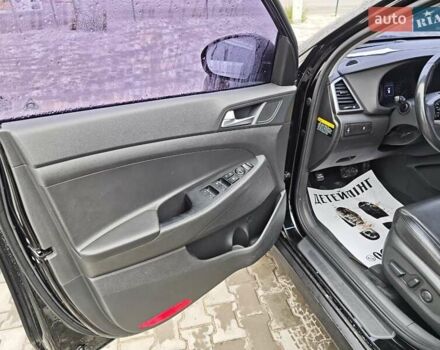 Черный Хендай Туксон, объемом двигателя 2 л и пробегом 178 тыс. км за 19200 $, фото 10 на Automoto.ua